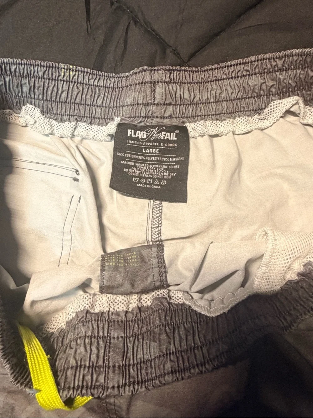 flag nor fail Grey Swim Trunks with Yellow Accents